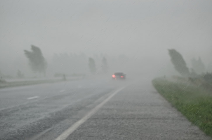 Cars driving in the rain